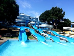 <p>a slide into a swimming pool,</p>