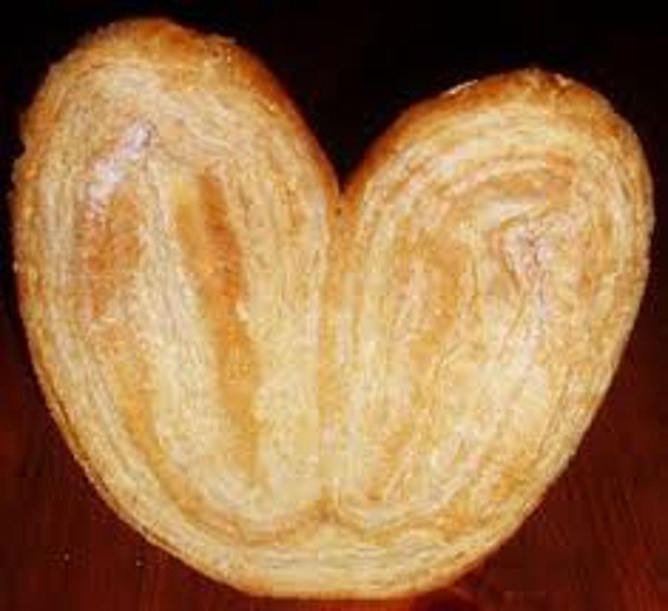 <p>palmier: a type of cookie that looks like a palm leaf, also called "elephant ears" in English</p>