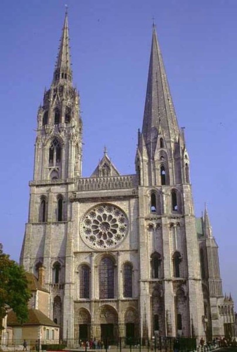 <p>Form:</p><p>-3 phases of Gothic (Early in facade, High French in back, Late in the North Spire)</p><p>-painted arches, rib vaults- Gothic elements</p><p>-colors vivid</p><p>-knowledge, nature, light</p><p>-limestone, stained glass</p><p>Content:</p><p>-stained glass- triforium</p><p>-narrow passageway</p><p>-jamb figures</p><p>-relic: Mary's dress</p><p>Function:</p><p>-Church with great beauty that honors Mary and gives her the respect she deserves</p><p>-built after they found Mary's Tunic unharmed in the fire</p><p>Context:</p><p>-Chartres, France</p><p>1145-55 CE</p><p>reconstructed in 1194 because of a fire</p><p>Roman> Gothic</p>