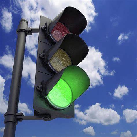 <p>Go. Press gas and go at green light in intersections </p>