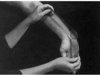 <p>Position: Supine, shoulder abducted to 70-90°, elbow extended, forearm supinated, fingers extended </p><p>Examiner: Extend the wrist </p><ul><li><p>Axis: Lunate</p></li><li><p>Stationary arm: Insertion of the biceps (radial tuberosity)</p></li><li><p>Movable arm: Anterior midline of the 3rd metacarpal  </p></li></ul>