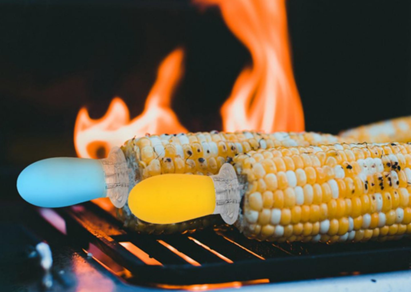 <p>small handles that go into each end of a piece of corn so you can eat it without burning your fingers.</p><p>I always use _________ to eat the hot corn without burning my fingers.</p>