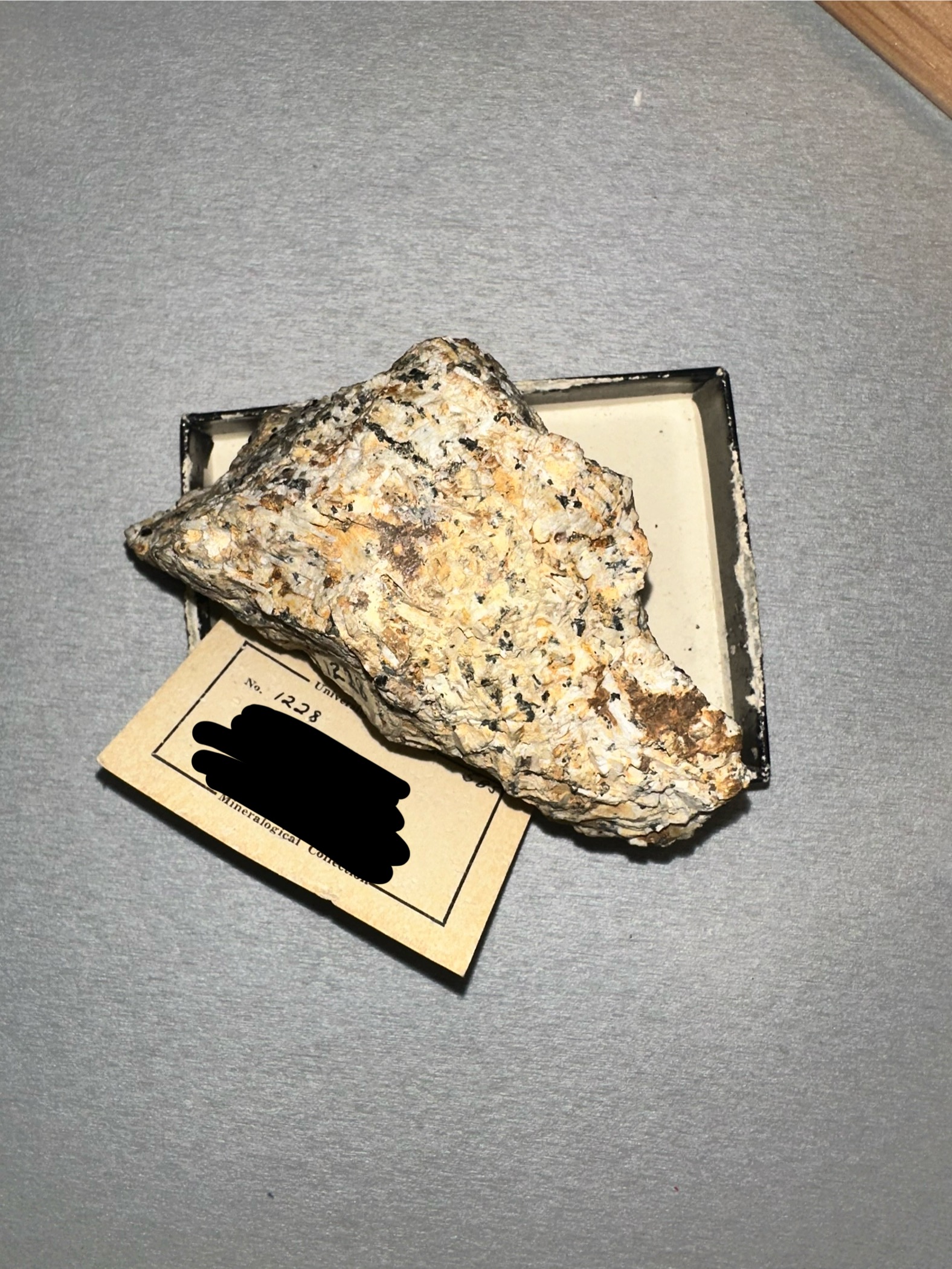 <ul><li><p>Hardness: ~5.5–6 (matrix varies)</p></li><li><p>Luster: Dull to vitreous</p></li><li><p>Color/Streak: Gray, greenish; white streak</p></li><li><p>Cleavage: Poor (feldspar shows good cleavage)</p></li><li><p>Special: Quartz-free feldspathoid rock</p></li></ul><p></p>