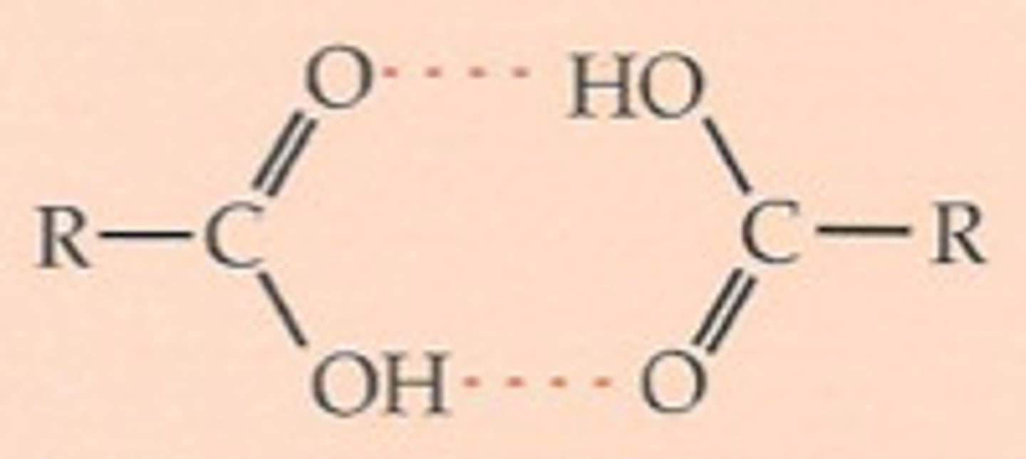 <p>Hydrogen bonding between two molecules of acid to form a dimer, as the OH groups can hydrogen bond to one another</p>