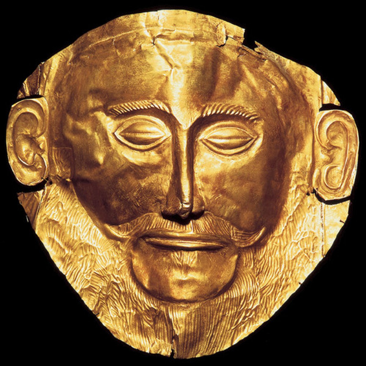 <p>Gold funerary mask from the Late Bronze Age (ca. 1600 BCE); misnamed; from Grave Circle A; funerary display of elite male; earliest Mycenaean goldwork.</p>