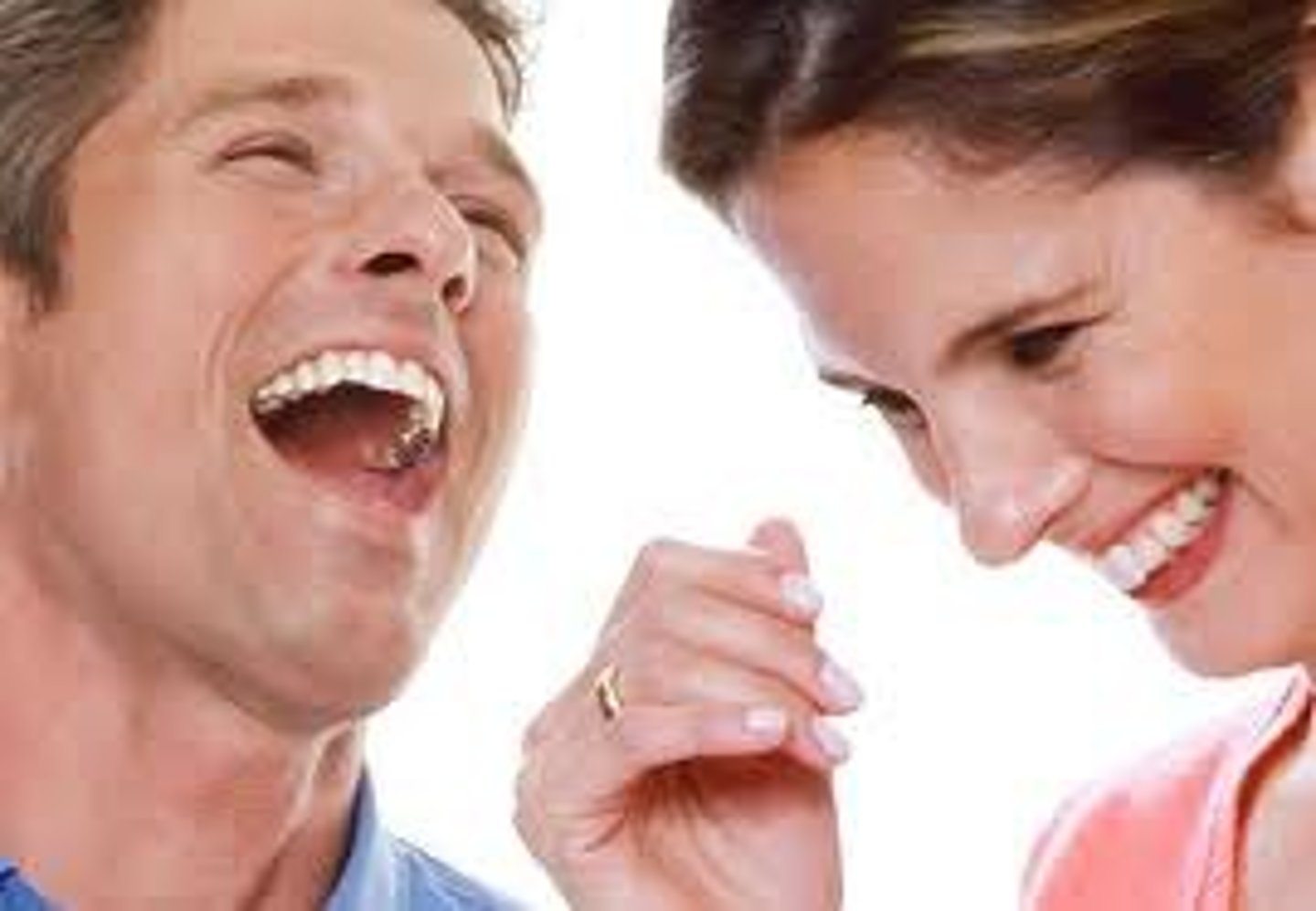 <p>they are laughing</p>