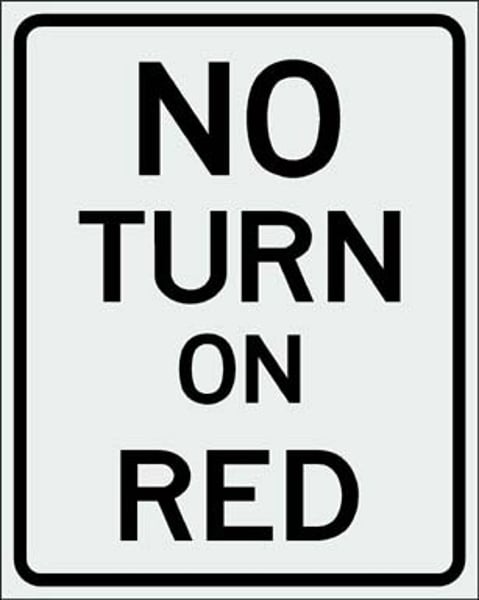 <p>Drivers may not turn right at a red light if they see this sign.</p>