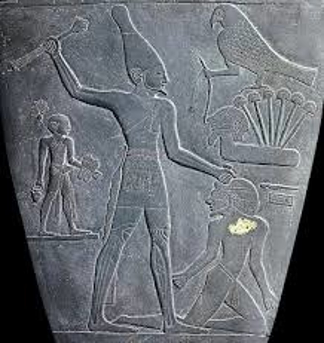 <p>(Predynastic Egypt. c. 3000–2920 BCE. Greywacke)</p><p>Content: Relief carvings showing Narmer wearing the crowns of Upper &amp; Lower Egypt; scenes of conquest; animals symbolizing unification.</p><p>Form: Carved greywacke stone; registers organize narrative; hierarchical scale (Narmer largest); twisted perspective (frontal + profile).</p><p>Function: Ceremonial palette (not for daily cosmetic use); commemorates unification of Egypt under Narmer; legitimizes rule.</p><p>Context: Predynastic art; one of the earliest historical records; found in a temple at Hierakonpolis; shows early Egyptian artistic conventions.</p>