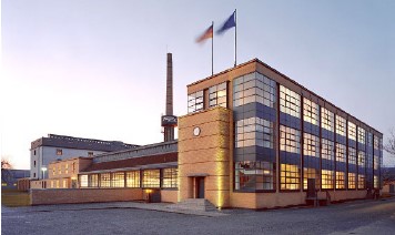 <p>The Bauhaus's relationship with the industrial world, aiming to give image to industrial production through modern design and collaboration with the government.</p>