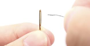 enfiler une aiguille