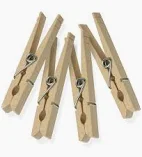 a spring loaded pin used yo hold diffusion, cinfoil or gels on barn doors of peppers and other lights. 