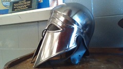 Enclosed helmet with high center crest