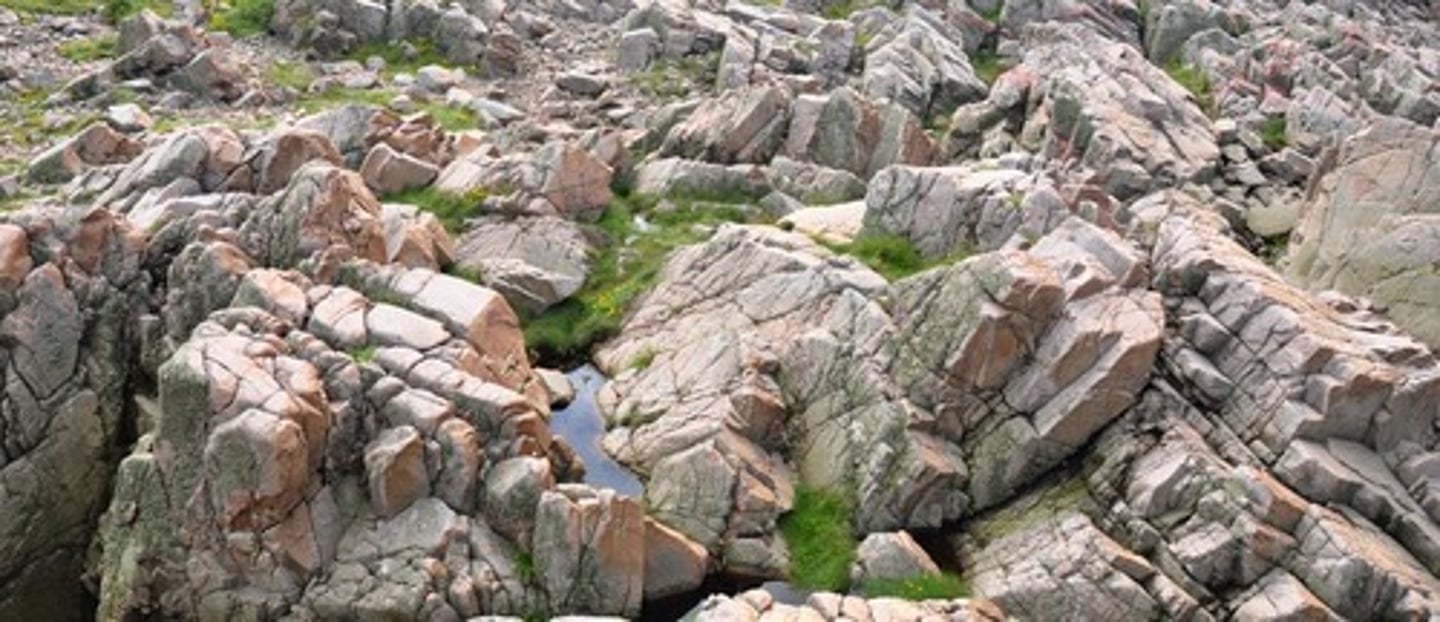 <p>rugged, craggy</p>