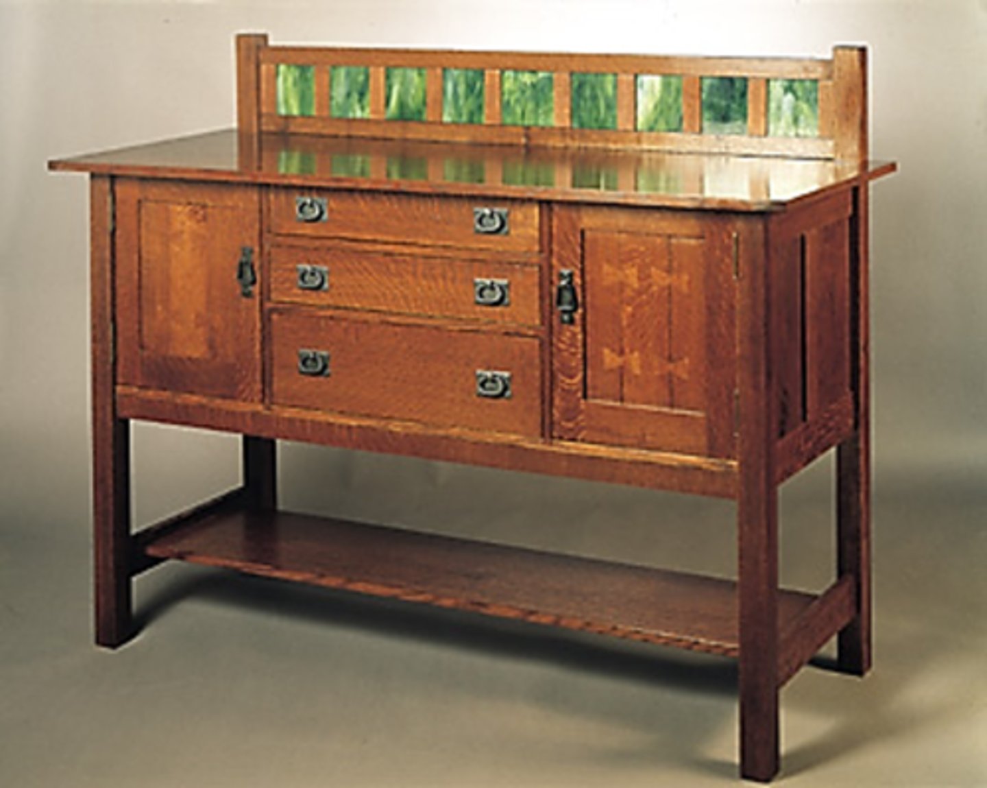 <p>Gustav Stickley<br>metal fixtures<br>grid<br>repeating units<br>subdivision<br>arch is to make it feel bouncy and lighter<br>bouncy transition to the legs and ground</p>