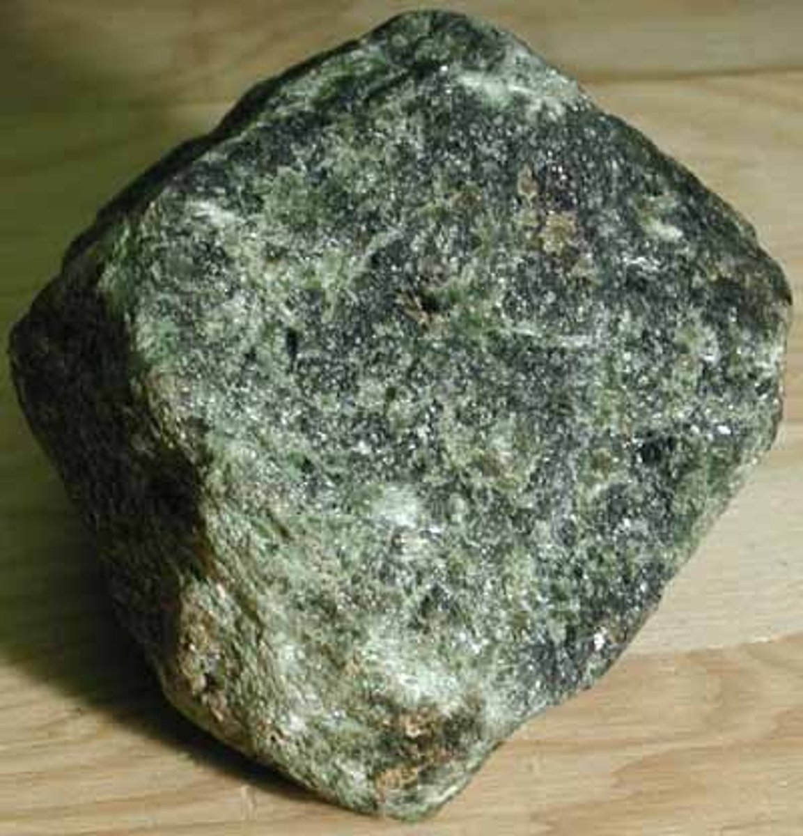 <p>- Igneous rock<br>- Ultramafic<br>- Course-grained crystalline</p>