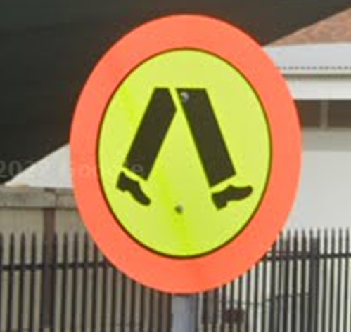 <p>Which Australian state have road signs with a fluorescent border?</p>