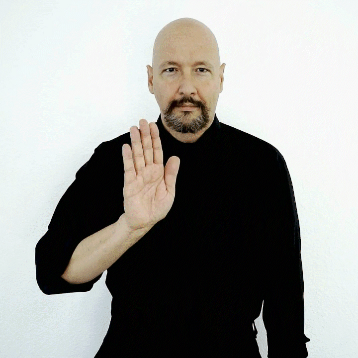 <p>Place a FLAT palm away from your chest (in front of you)</p>
