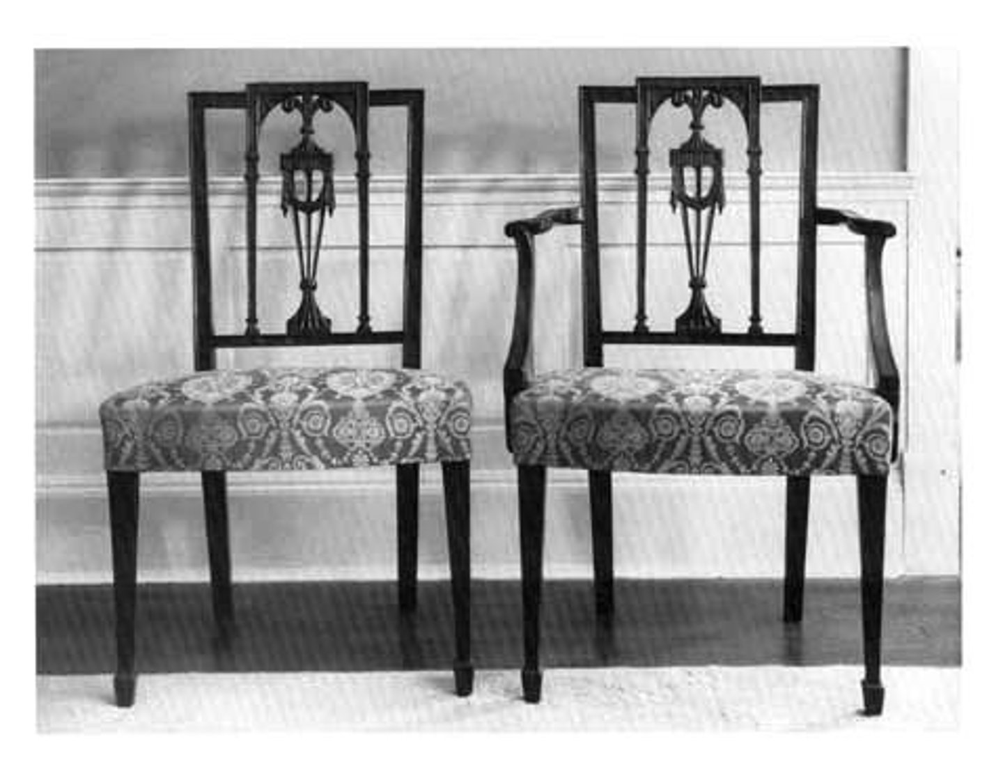 <p>chairs split into 3 vertical sections</p><p>rear legs continues up and made back of chair</p><p>ornamental rail running across top</p><p>space between two rails has ornamental splat</p><p>center often has elongated vase</p><p>designs are most imitated today</p>