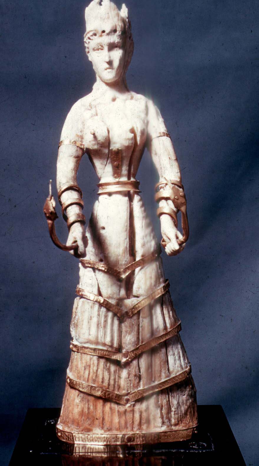 <p>The chryselephatine (gold and ivory) figure of a snake goddess in the MFA, Boston </p>