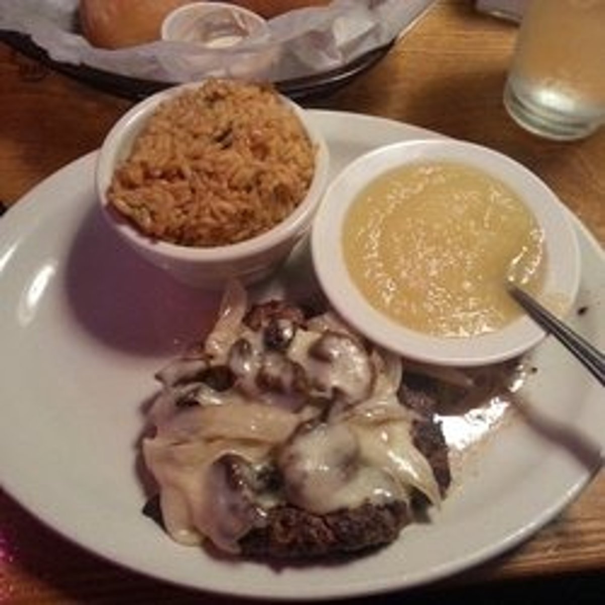 <p>10 oz of chopped steak topped with sautéed mushrooms and ion ions covered with jack cheese</p>