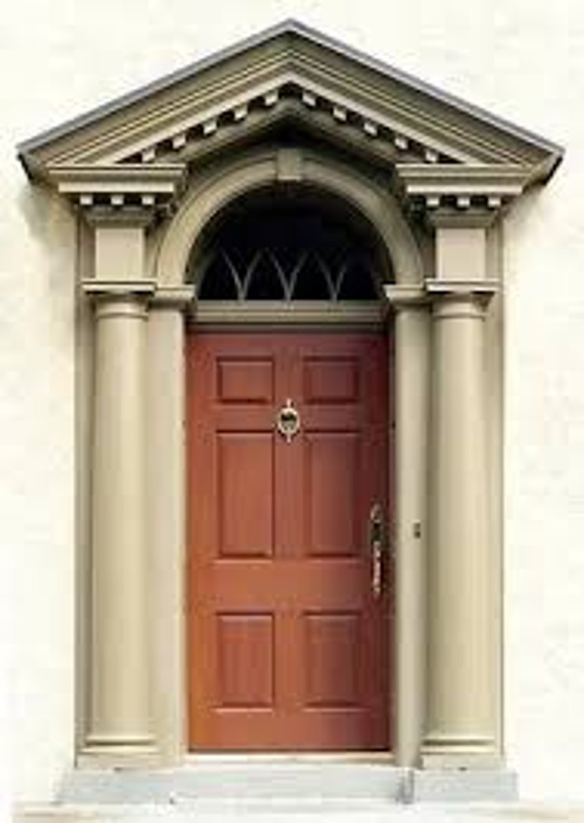 <p>Pediment- a triangular shaped element historically made of stone. Modern pediments are imitated in a variety of materials</p>