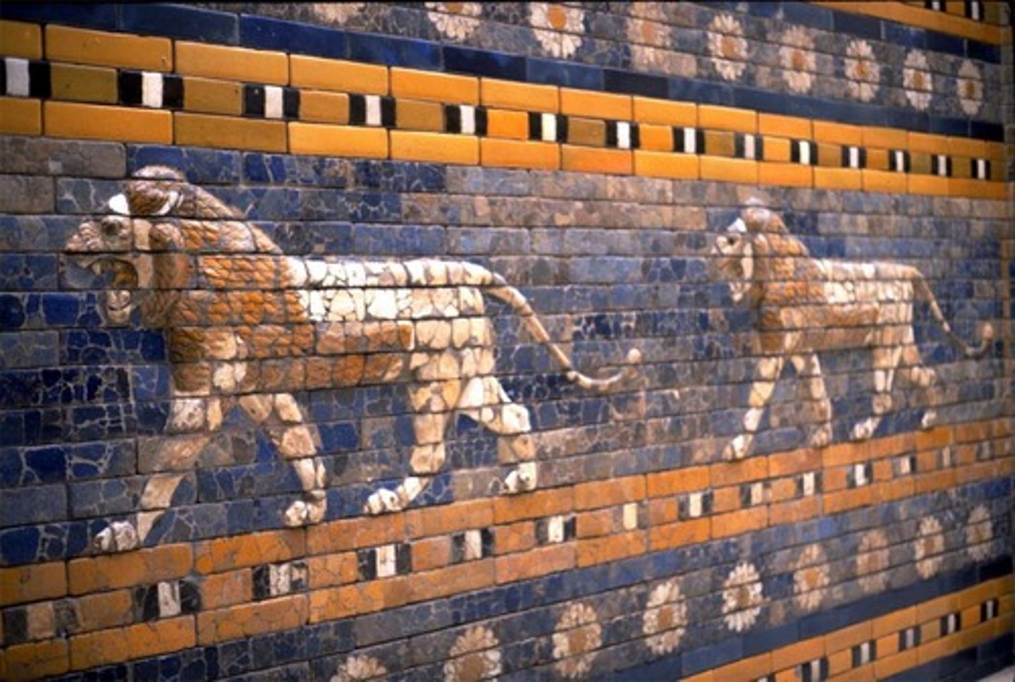 <p>Bricks painted and then kiln fired to fuse the color with the baked clay; used to construct the entrance to Babylon</p>