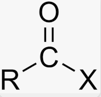 <p>Carbon with an oxygen double bond, and connected to hydrogen or carbon, and connected to either F, Cl, Br, or I</p>