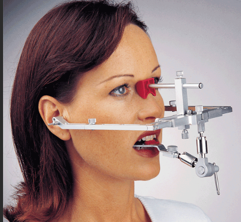 <ul><li><p>device used to transfer the skull-based position of maxilla and hinge axis to articulator</p></li></ul><p></p>
