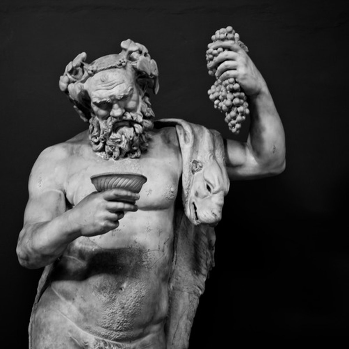 <p>-God of wine, the vine, grape-harvest, theater, and madness</p><p>-Roman name: Bacchus</p><p>-Symbol: the grape vine</p>