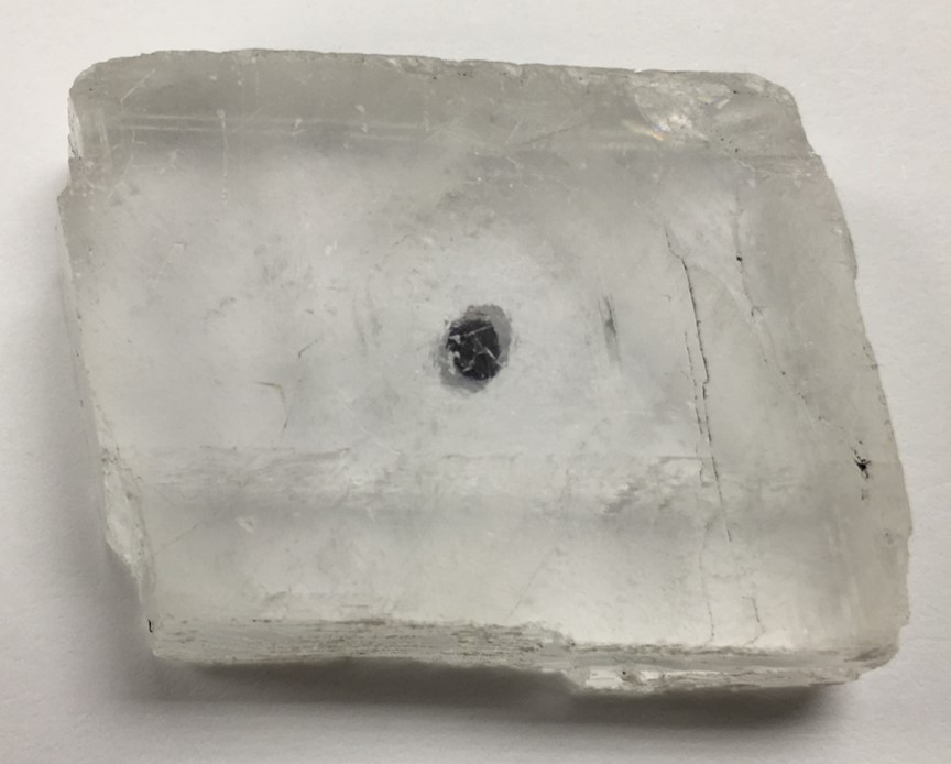 <p>carbonate </p><p>CaCO3</p><p><span>perfect rhombohedral cleavage-</span><strong>occurs when there are three cleavage planes intersecting at angles that are not 90 degrees</strong></p><p><span>fizzes with acid</span></p><p><span>Translucent </span></p><p><span>hardness of three</span></p>