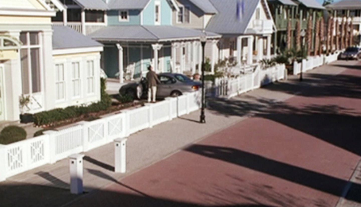 <p>Suggests entrapment - a lovely fence to keep you in. It also promotes the idea of The American Dream. "Children, wife, house and white picket fences."</p>