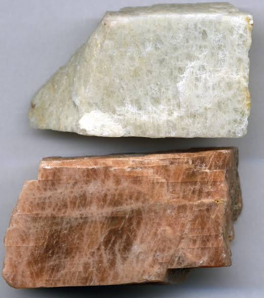 <p>Cleavage where the mineral breaks along two planes (also identify mineral)</p>