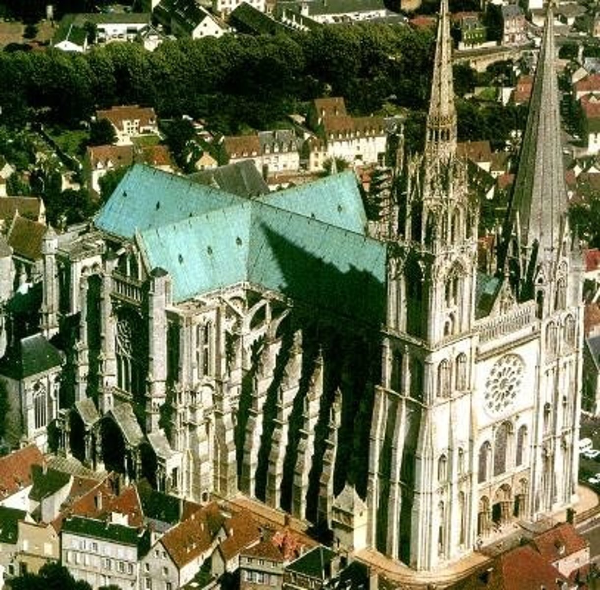 <p>Gothic cathedral in Chartres, France with sculptures, stained glass windows, and carvings of Bible stories.</p>