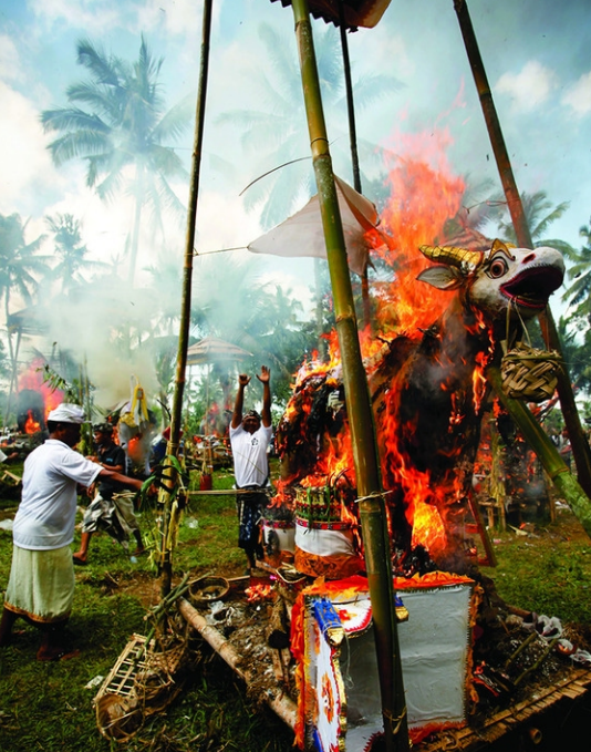 <p>The Cremation Ceremony held in ___, Indonesia, is a ritual performed to send the deceased to the next life. The body is placed in a wood coffin inside a temple-like structure made of paper and wood. The structure and body are burned to release the deceased’s spirit and enable reincarnation.</p>