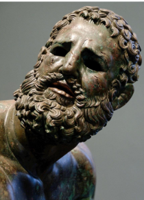 <ul><li><p><strong><span>Boxer</span></strong></p></li><li><p><strong><span>Hellenistic Period</span></strong></p></li><li><p><span>4’ high&nbsp;</span></p></li><li><p><span>Bronze&nbsp;</span></p></li><li><p><span>This sculpture is highly realistic in its portrayal. Rather than idealizing the fighter as he would have been in previous periods, he shows cuts and scars on his face and torso. This was highlighted by the sculptor with the use of red/orange copper inlay.</span></p></li><li><p><span>His flesh is sagging in the middle showing his age.</span></p></li><li><p><span>His face is full of expression of weariness: his nose is broken, his ears are damaged (cauliflower ear)</span></p></li><li><p><span>On his hands are leather knuckle straps that were commonly worn when boxing and would have inflicted serious damage on their opponent.</span></p></li></ul>