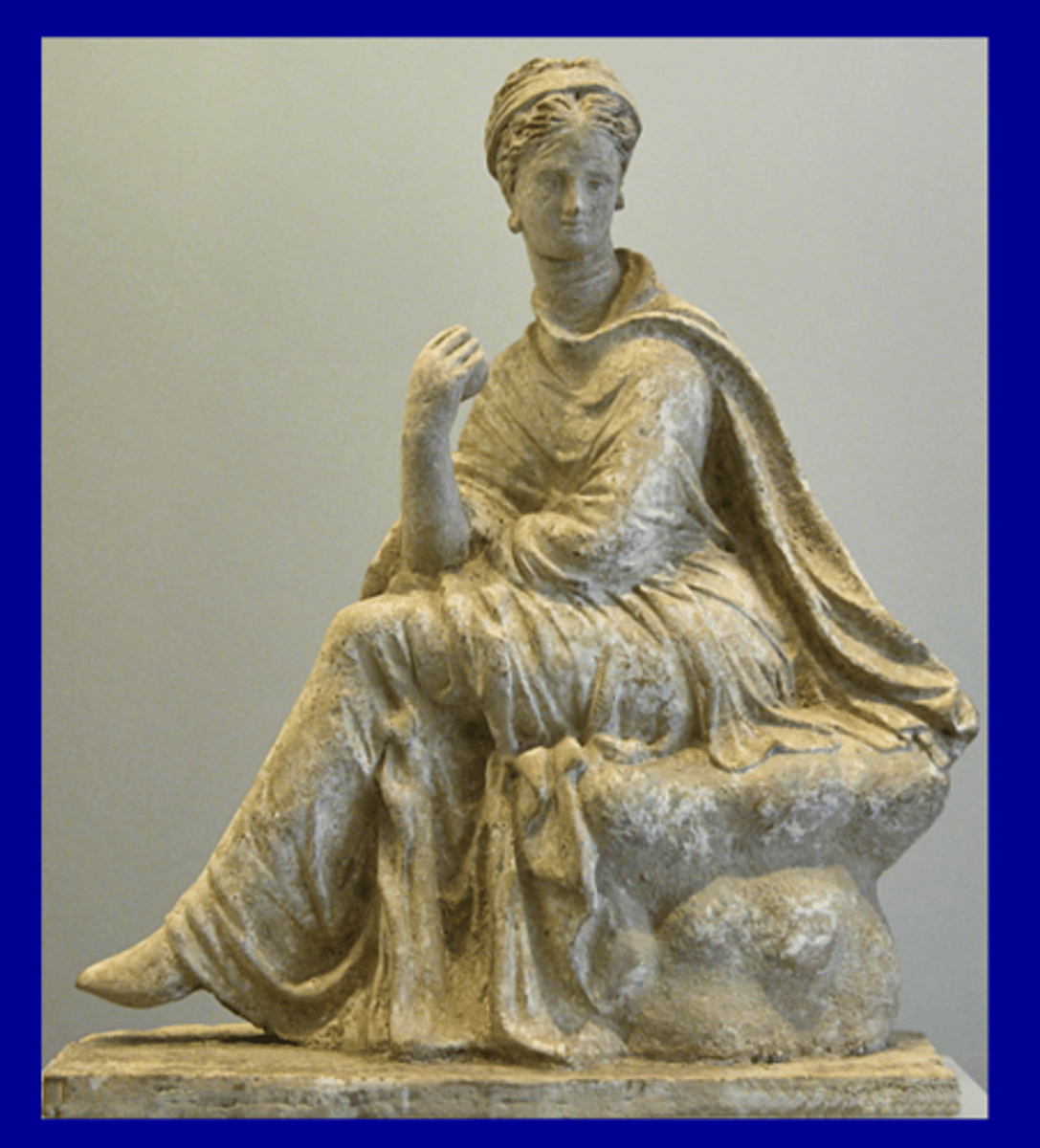 <p>seated terracotta statuette of lady with apple. From Tanagra (Boiotia), Copenhagen, Ny Carlsberg Glypothek. Late 4th c. BCE.</p>