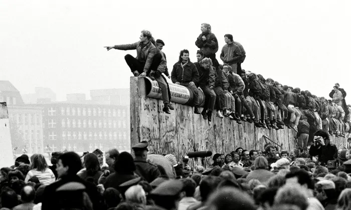 People watching the fall of the Berlin Wall.