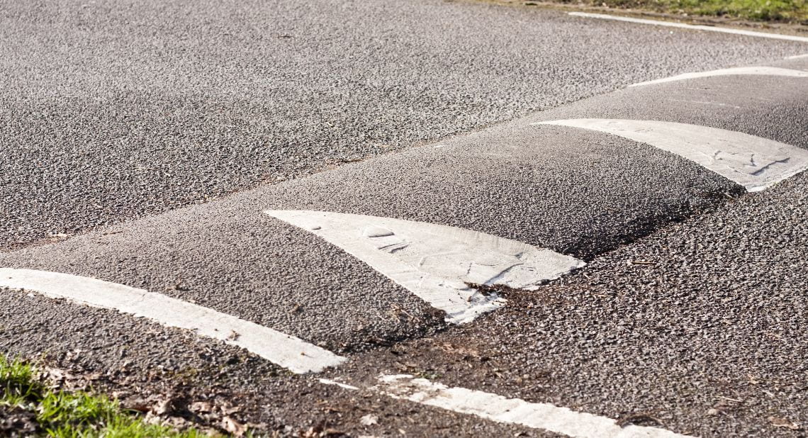 <p><strong>Slow down your speed, and slowly steer in a forward direction, and avoid overtaking. </strong></p><p>Driving past such obstacles at fast speeds would damage your carriage and wheel alignments.</p>