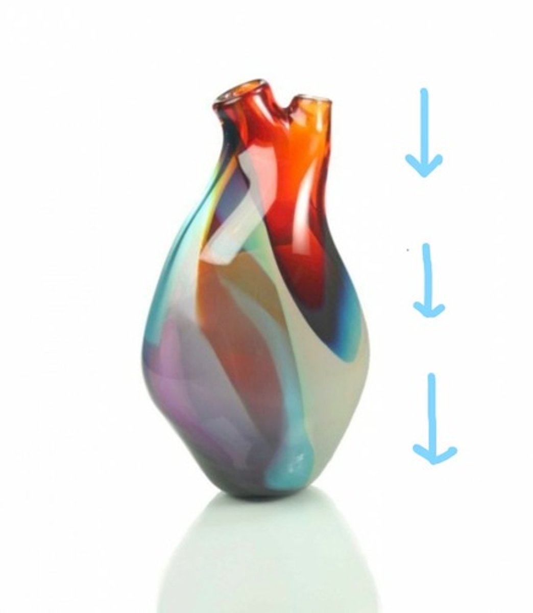 <p>places a vase onto it</p>