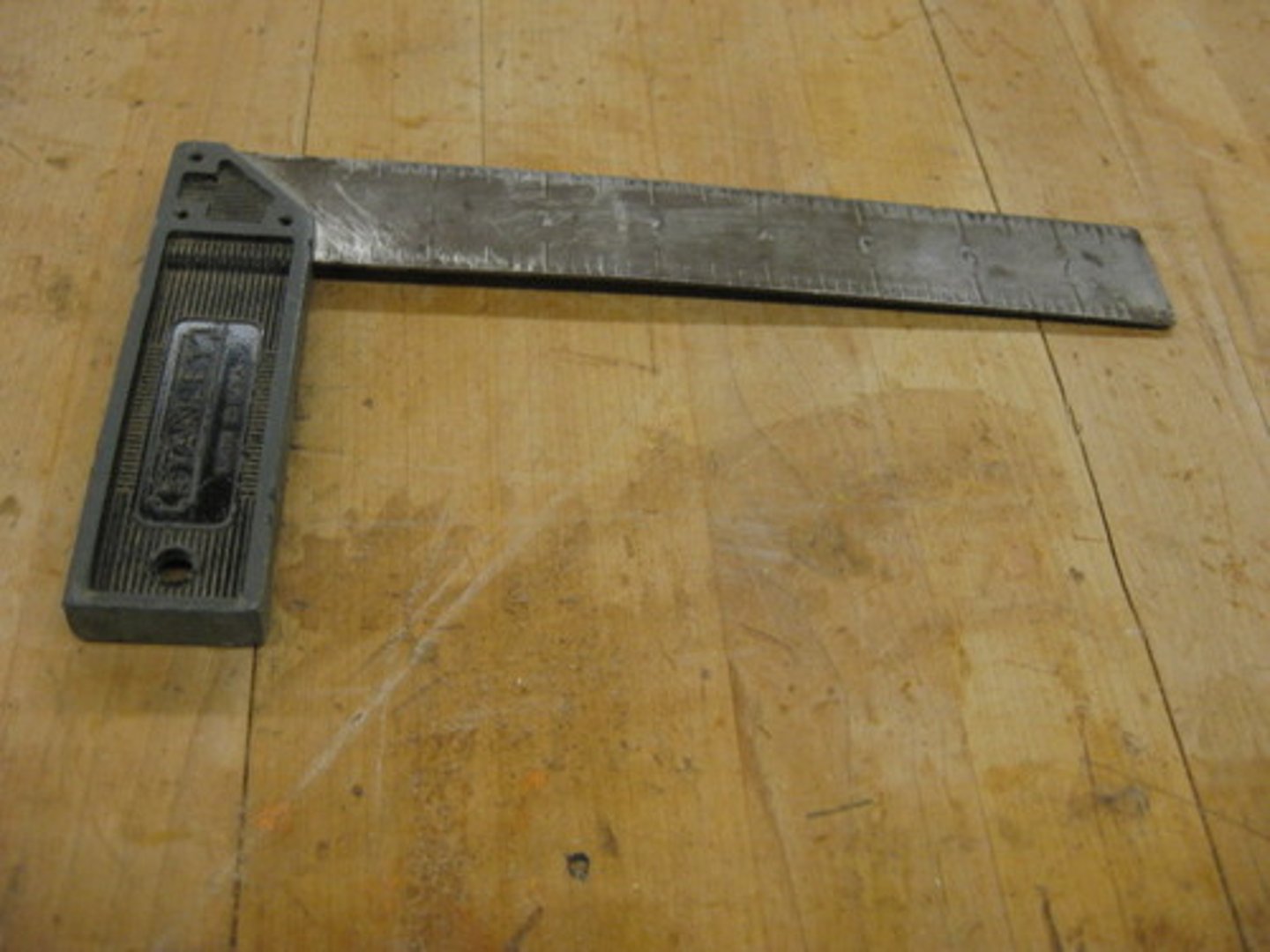 <p>Woodworking tool used to mark a line at 90 degrees to the edge of the wood or finding "square".</p>