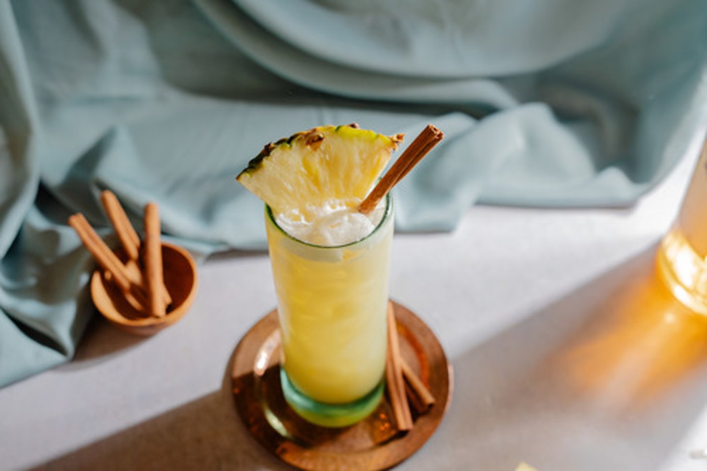 <p>Churro Colada</p><p>- Don Q 7 Year rum</p><p>- Pineapple juice</p><p>- Cinnamon Monin</p><p>- Reàl Coconut puree</p><p>Garnish: Cinnamon stick, pineapple wedge</p><p>Flavor profile: Sweet and fruity</p><p>Selling description: A sweet and fruity twist on a classic Piña Colada with notes of baking spices.</p>