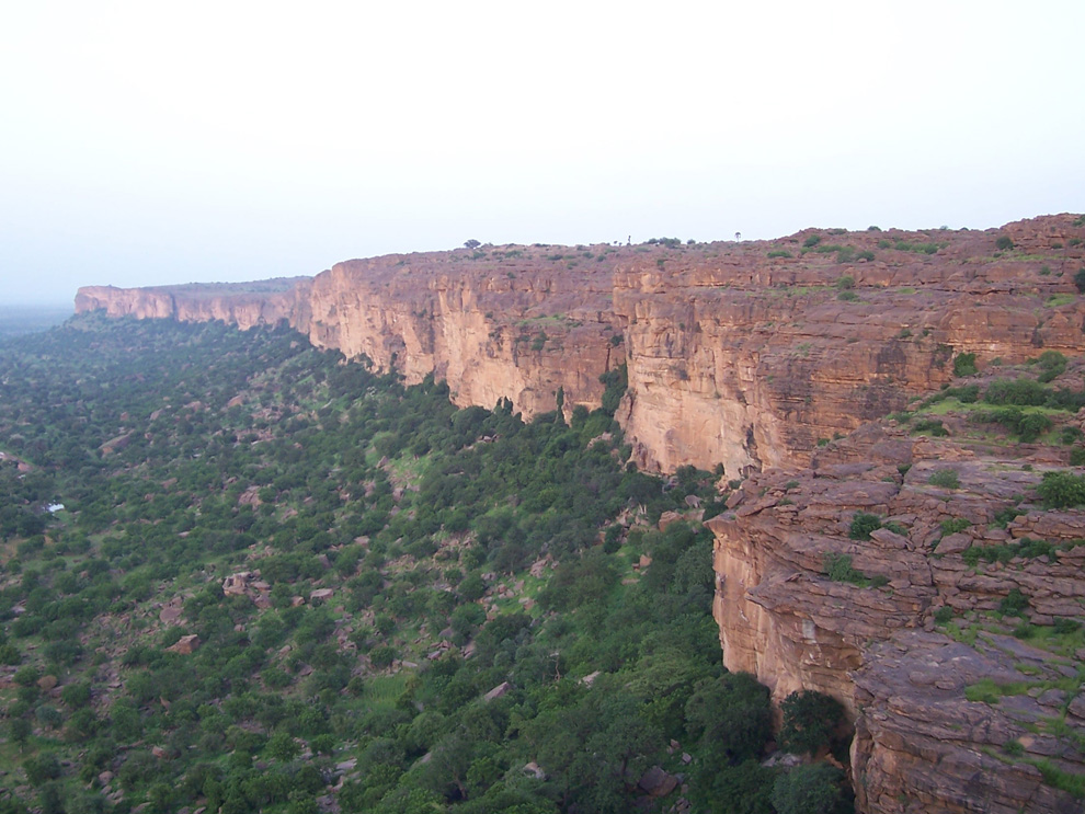 <p>Results from the <mark data-color="green">erosion-resistant rocks</mark> layers being<mark data-color="green"> left behind</mark> once<mark data-color="green"> softer rock layers </mark>have been <mark data-color="green">eroded away</mark></p>