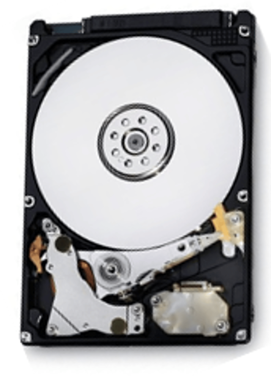 <p>Allows you to store digital data. Data is divided into sectors and partitions.</p><p>E.g.: HDDs and SSDs.</p><p>Classroom analogy: filing cabinet where all documents for the class are stored.</p>