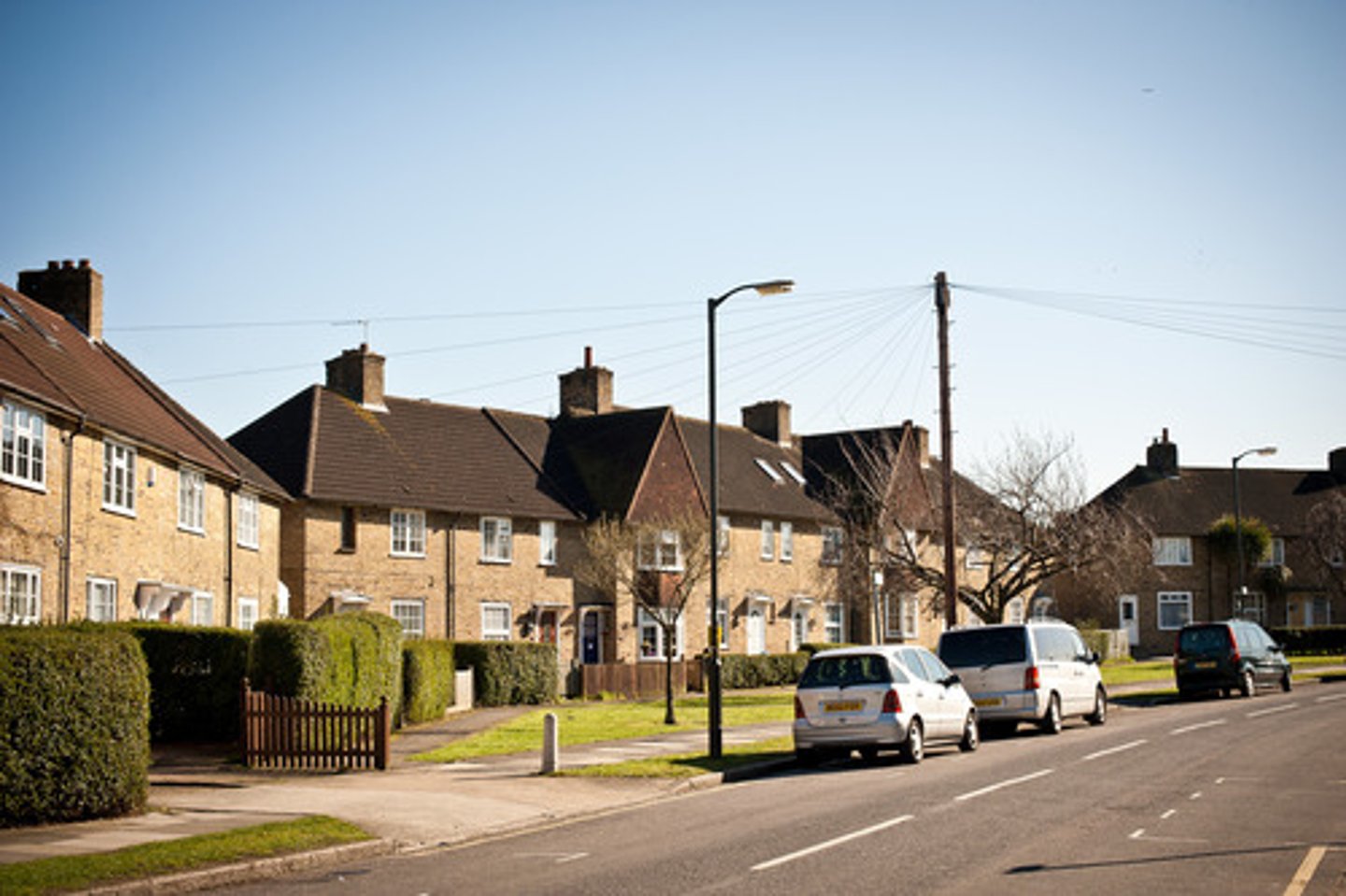 <p>A smaller community located near a large city where many people live.</p>