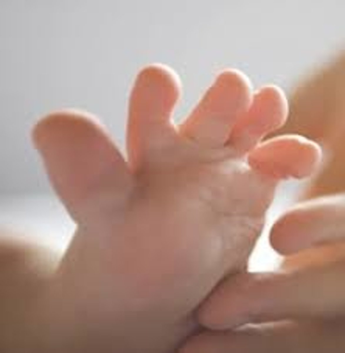 <p>Newborns dorsiflex and fan out toes</p>