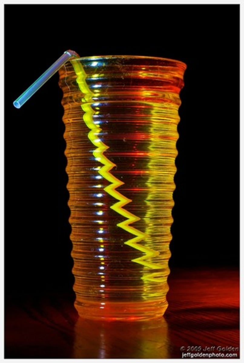 <p>when a ray of light travels through the glass slide and comes into contact with air and it bends.</p>