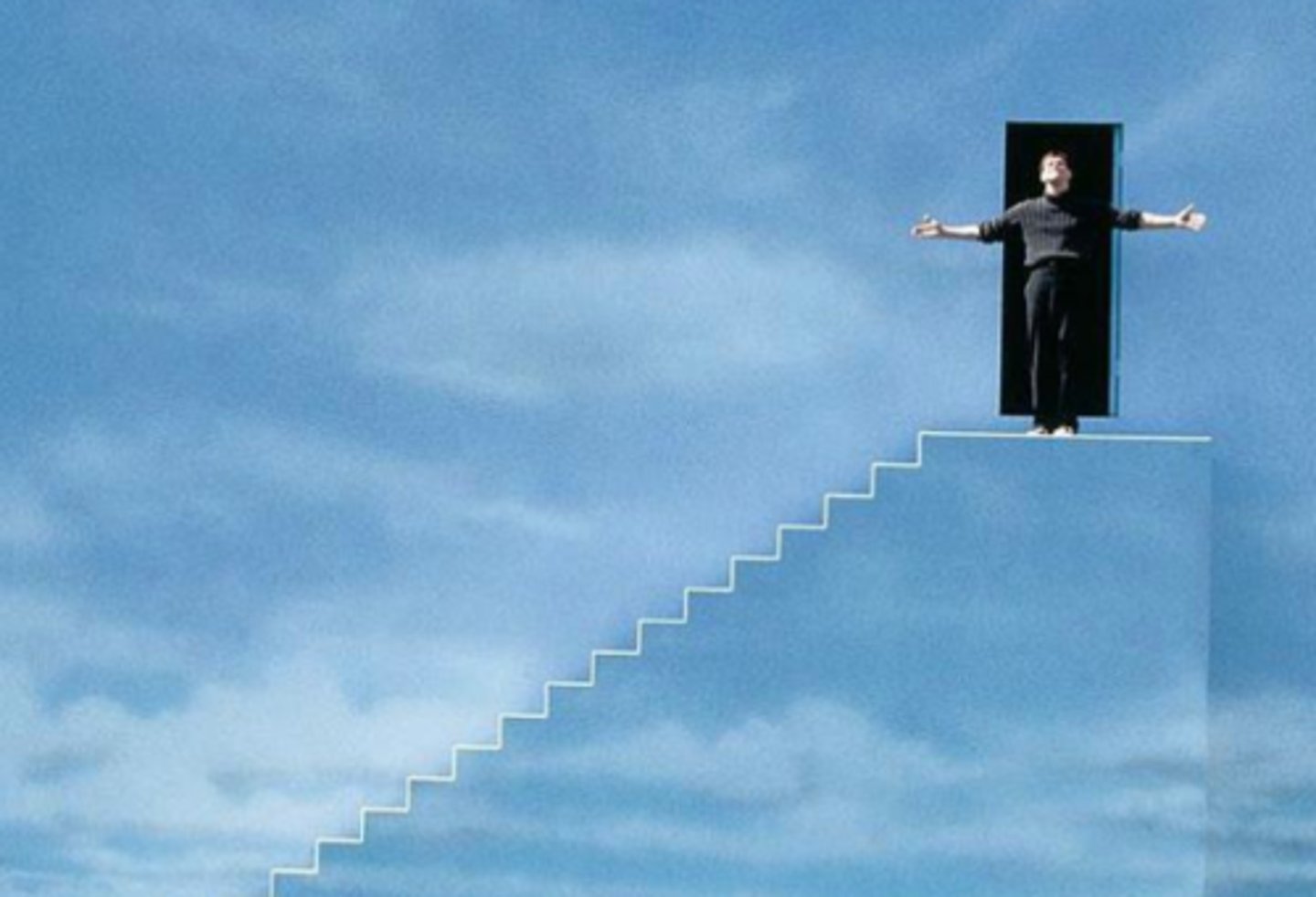 <p>The wall that Truman hits is the end of his known world. The wall is a metaphor for the world that has trapped Truman since birth, and he has now been reborn into the "real world". The wall confined him, trapped him, but through inner strength and conquering a great fear, he is able to find a way out.</p><p>Truman has said goodbye to his creator (Christof) and to his audience and has left the stage. He heads out into the dark, the unknown, but into the real world.</p>