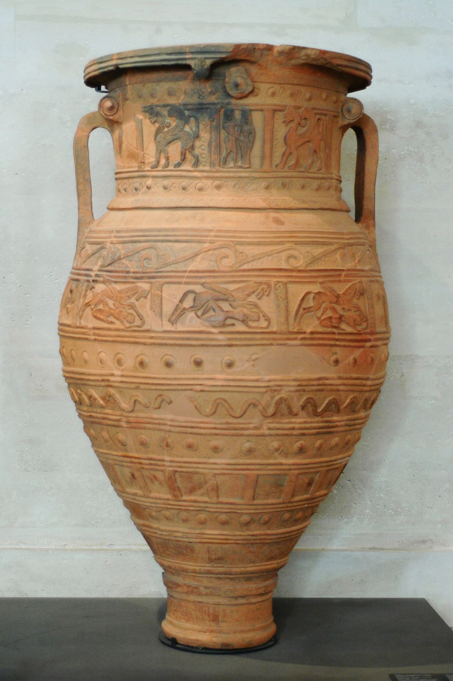 <p>a large storage container, vase shaped</p>