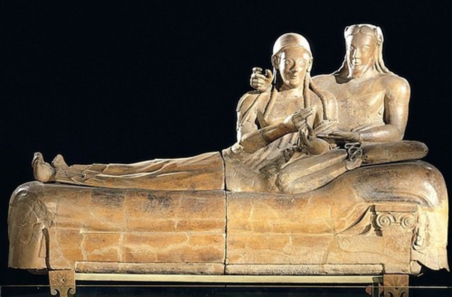 <p>(Ca 520 BCE) Painted terracotta, heavily reconstructed. Depicts the couple as young and happy in the middle of a banquet. Note the stylization in the faces and lower body especially.</p>