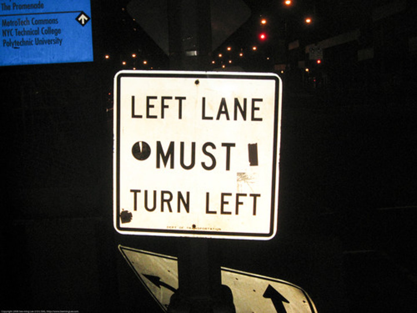 <p>Traffic in left lane must turn left at the intersection ahead.</p>